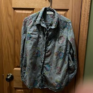 Size xl more like large embroidered accents, floral vintage look long sleeves.